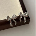 Boucles d’Oreilles Nœud